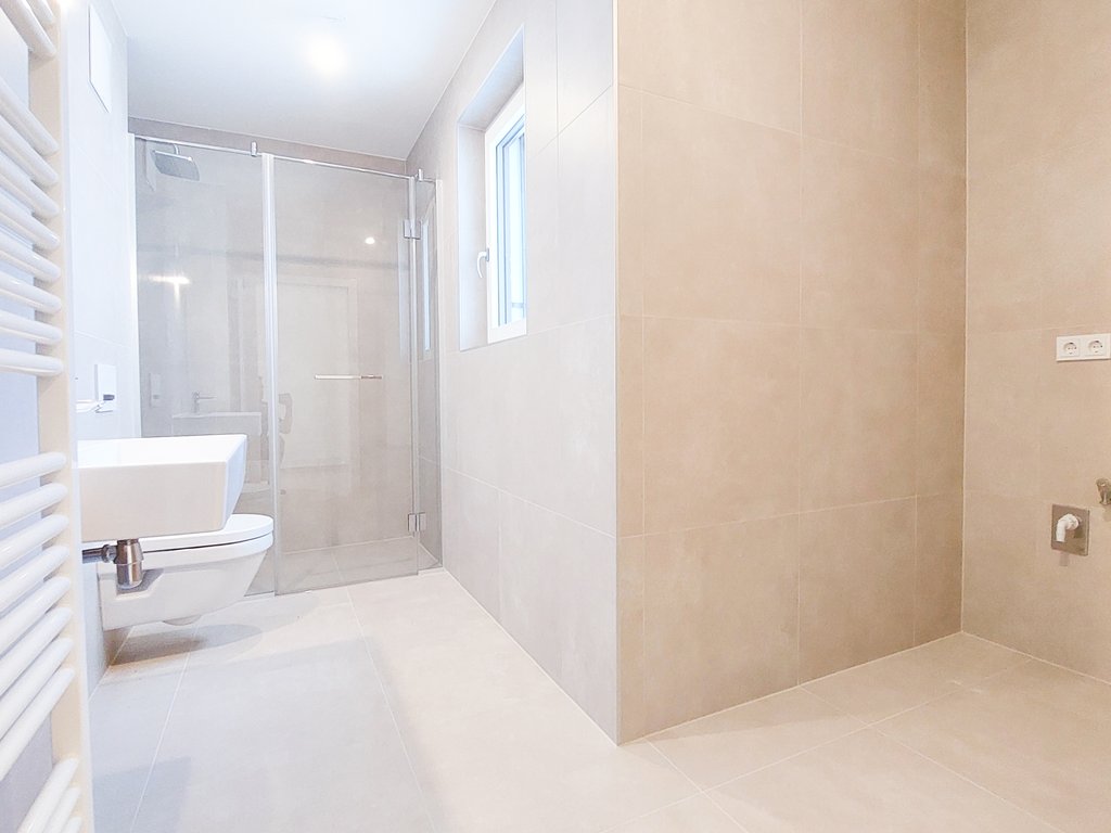 Badezimmer von Mühlhäufelweg 69 Top 3