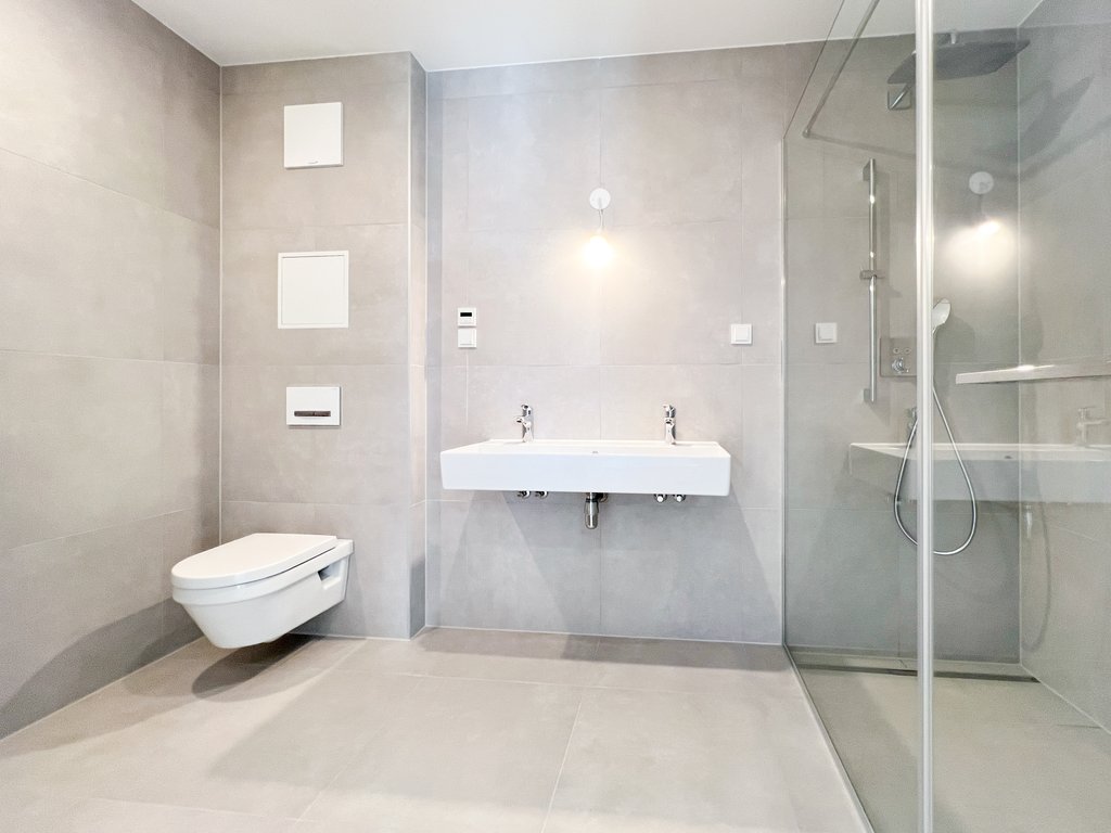 Badezimmer von Mühlhäufelweg 69 Top 1