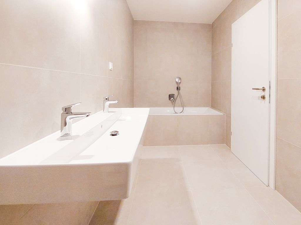 Badezimmer von Mühlhäufelweg 69 Top 3